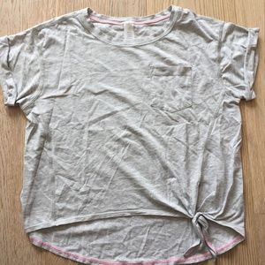 grey shirt with a knot